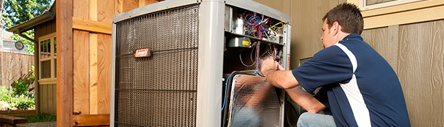 trade ally works on outdoor residential hvac unit